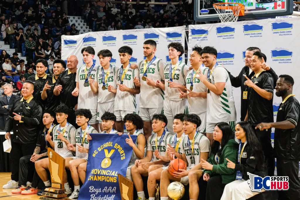 St. Pats takes a team photos with their provincial championship trophies.