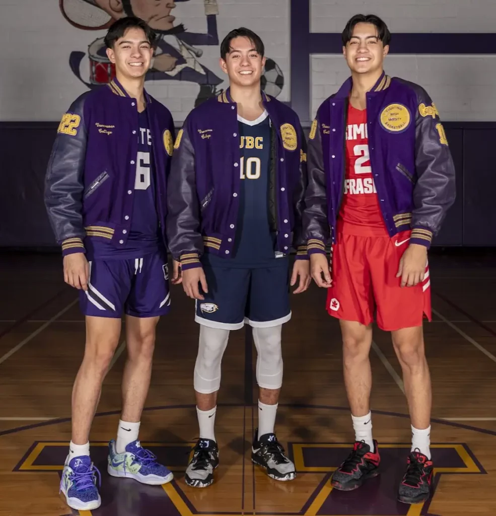 Hunter, Jack & Cole Cruz-Dumont pictured in  their University uniforms, while wearing a Vancouver College Varsity Jacket.