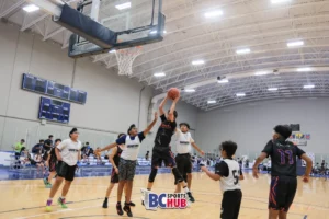#0 from Raincity Basketball rebounding the ball against Showtime Academy.