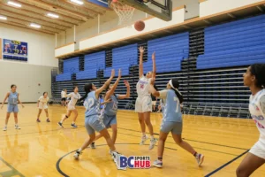 A Squad Basketball athlete makes an attempt at the rim.