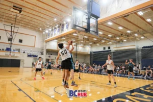 #50 from PGC Basketball Academy blocking a Fraser Valley Elite athlete.